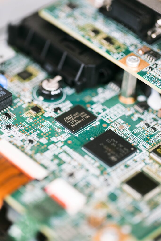 Photo by Jonathan Castañeda a close up of a motherboard with many wires
